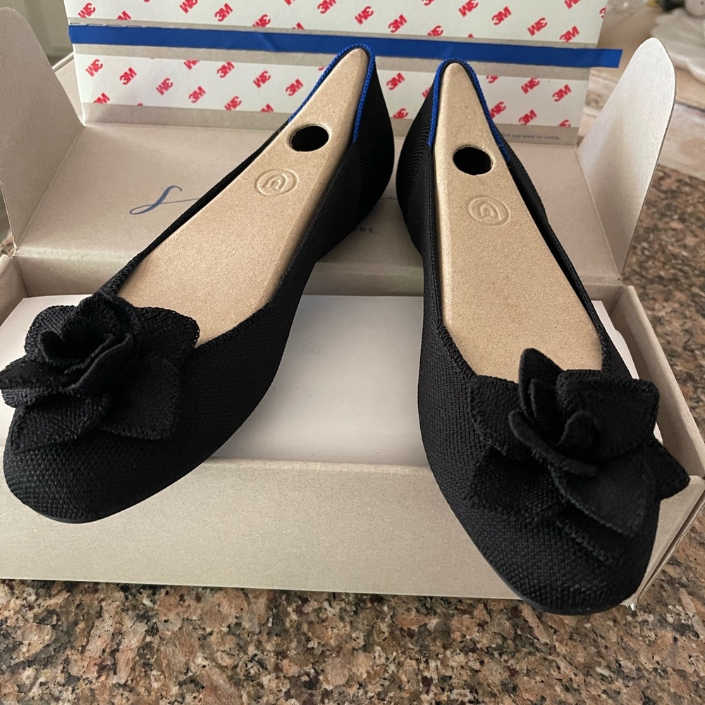 Rothy’s black size 8.5 Petal flats.  New in box